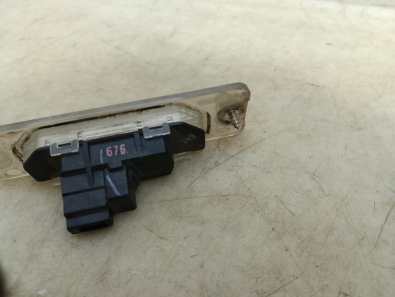 Фонарь подсветки номера