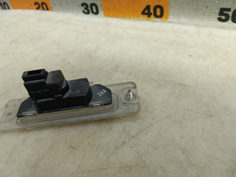 Фонарь подсветки номера