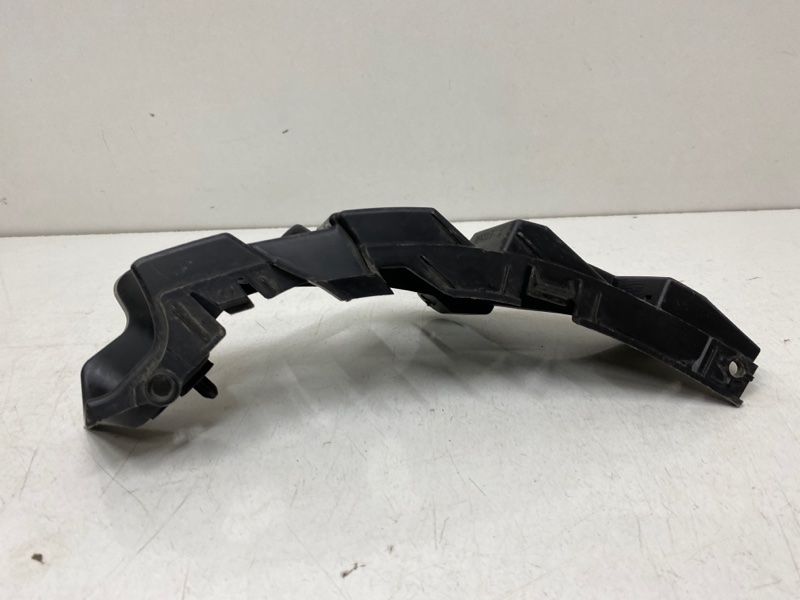 Кронштейн заднего бампера левый