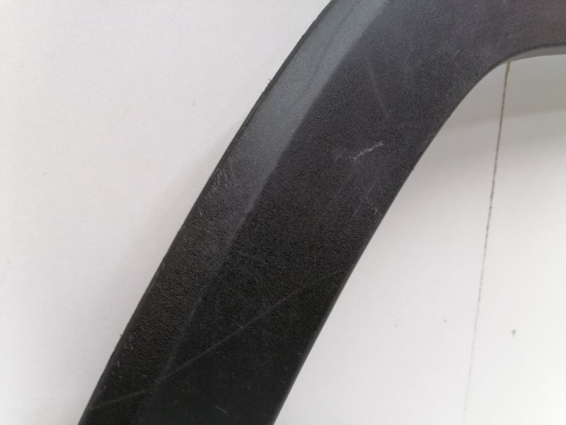 Накладка переднего крыла левого