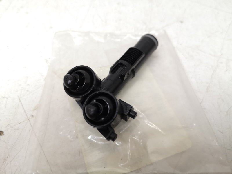 Форсунка омывателя фары