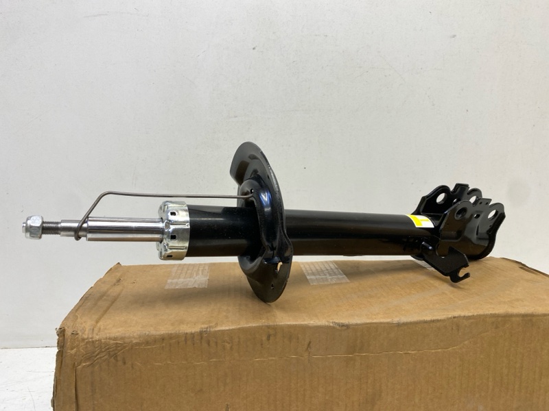 Амортизатор передний левый