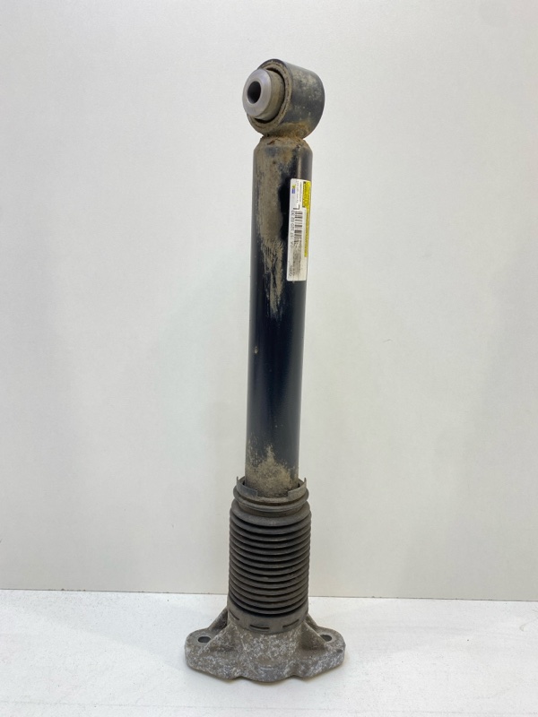 Амортизатор задний левый