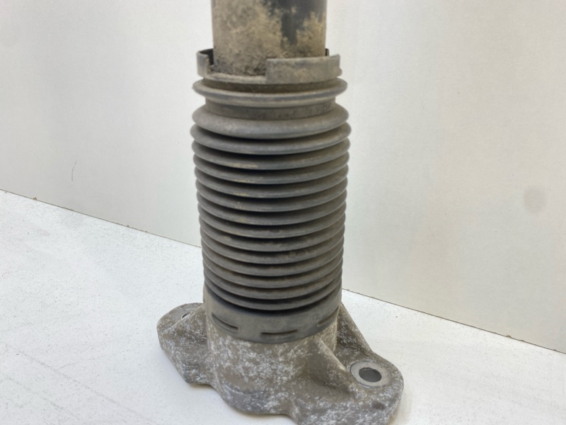 Амортизатор задний левый