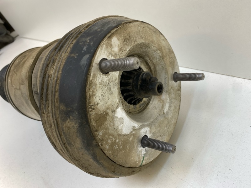 Амортизатор передний левый