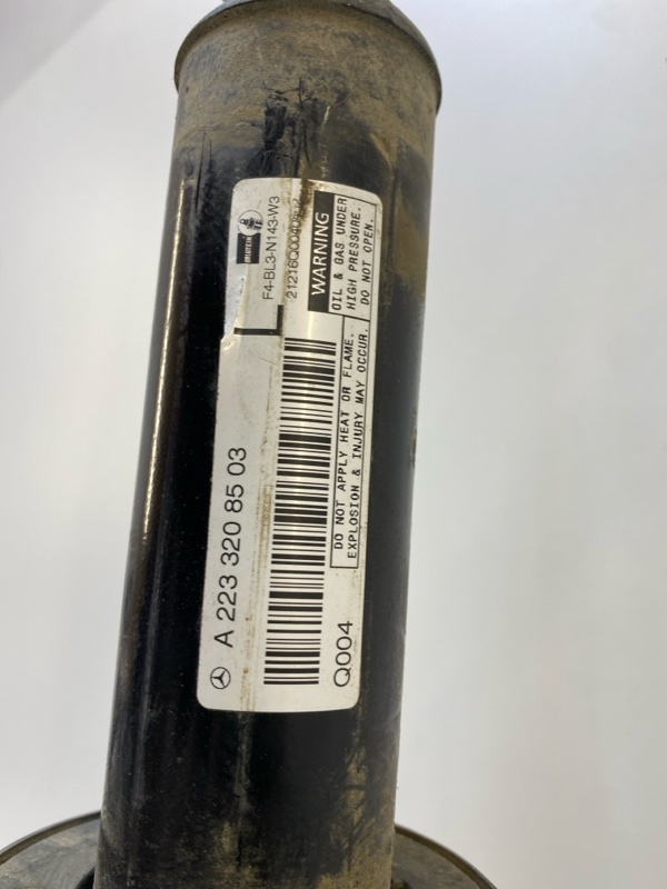 Амортизатор передний левый