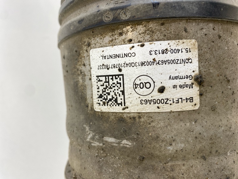 Амортизатор передний левый