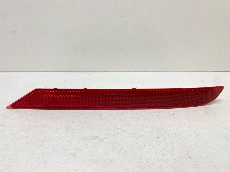 Отражатель в бампер задний левый