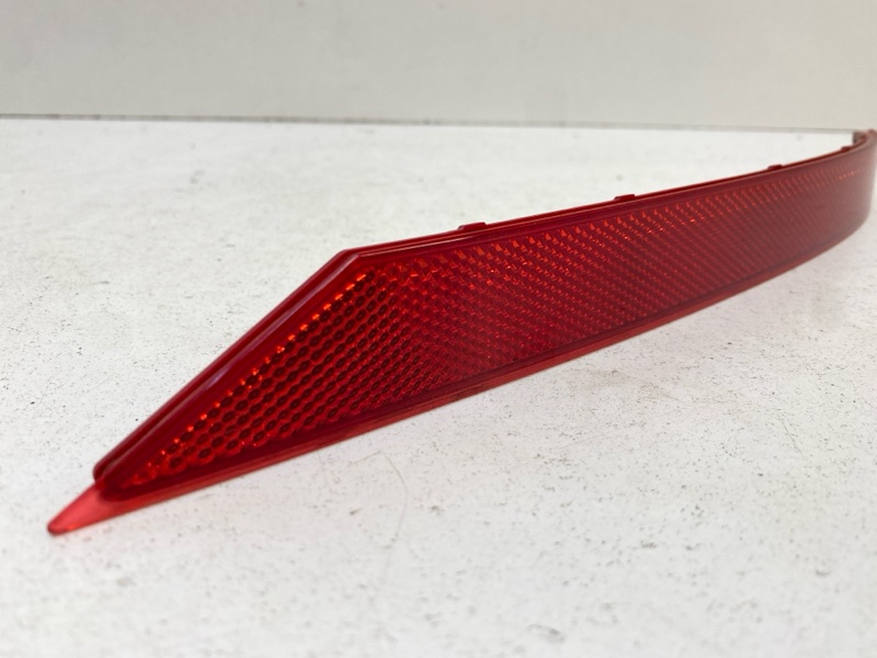 Отражатель в бампер задний левый