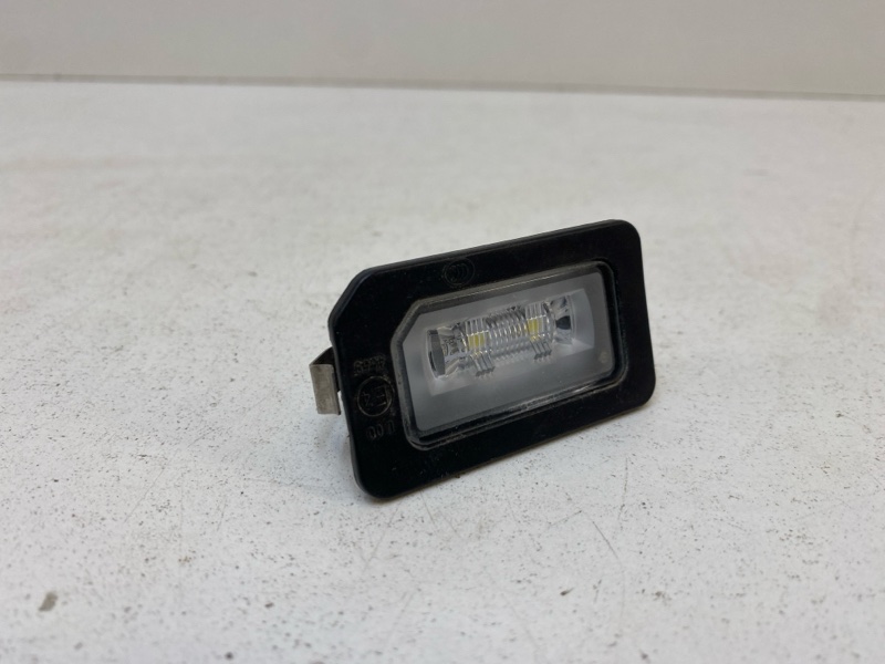 Фонарь подсветки номера