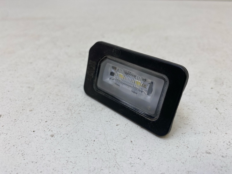 Фонарь подсветки номера