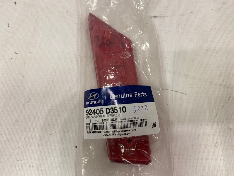 Отражатель в бампер задний левый