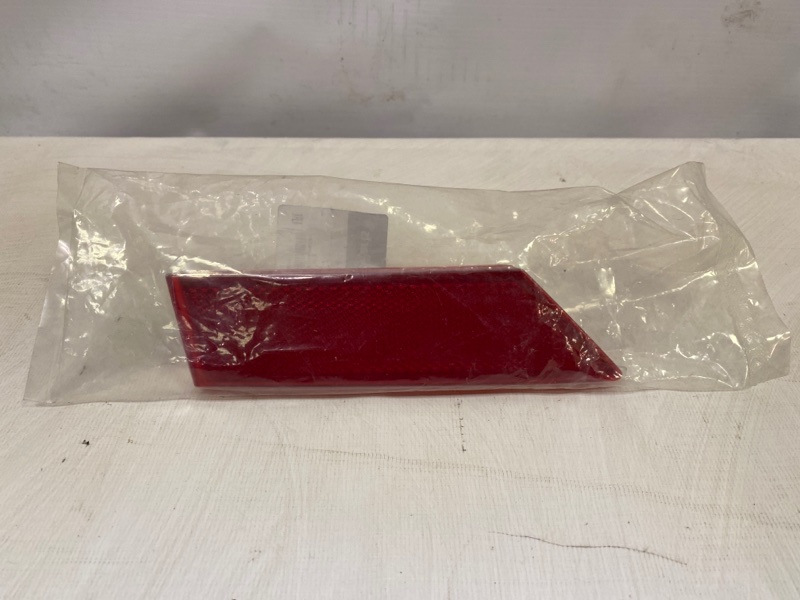 Отражатель в бампер задний левый