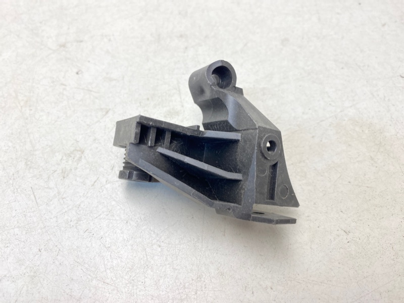 Кронштейн фар левый