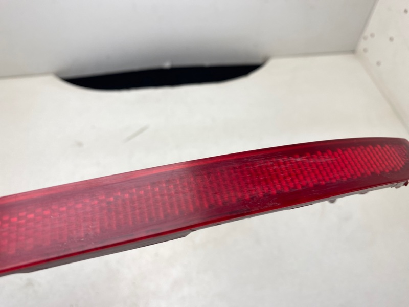 Отражатель в бампер задний левый