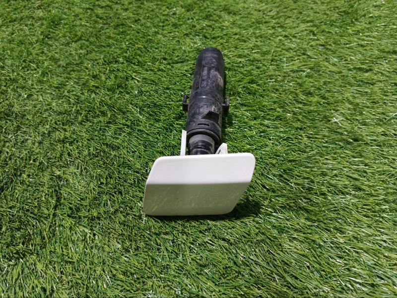 Форсунка омывателя фары