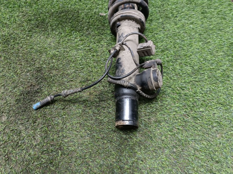 Амортизатор передний левый