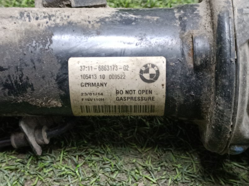 Амортизатор передний левый