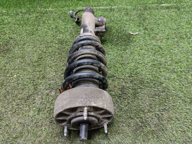 Амортизатор передний левый