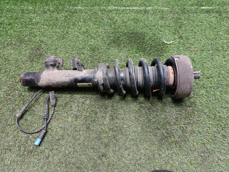 Амортизатор передний левый