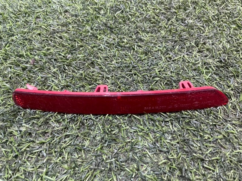 Отражатель в бампер задний левый