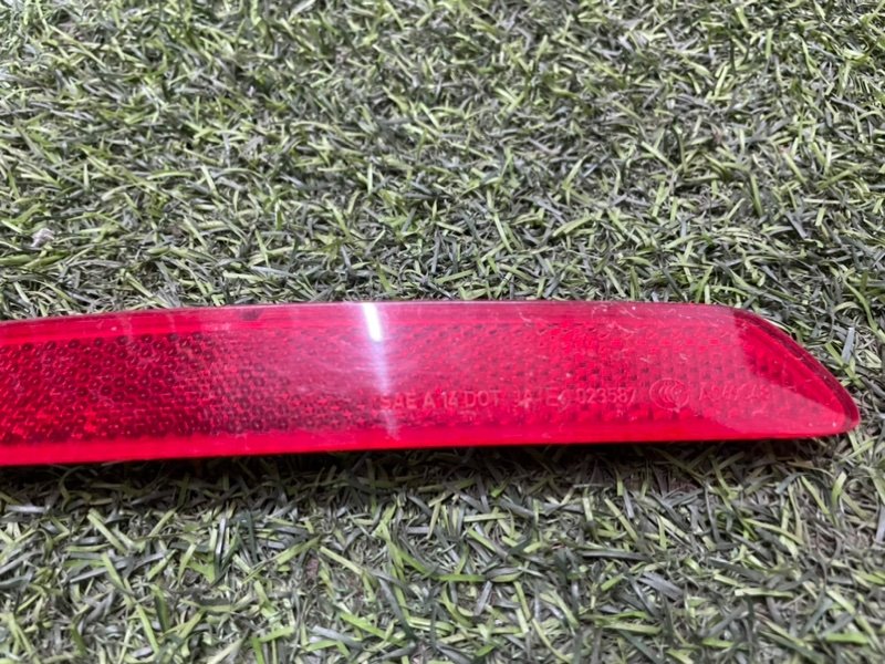 Отражатель в бампер задний левый