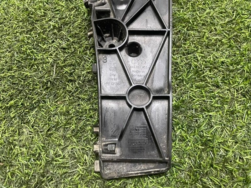 Кронштейн заднего бампера левый