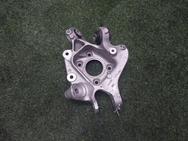 Кулак поворотный задний левый