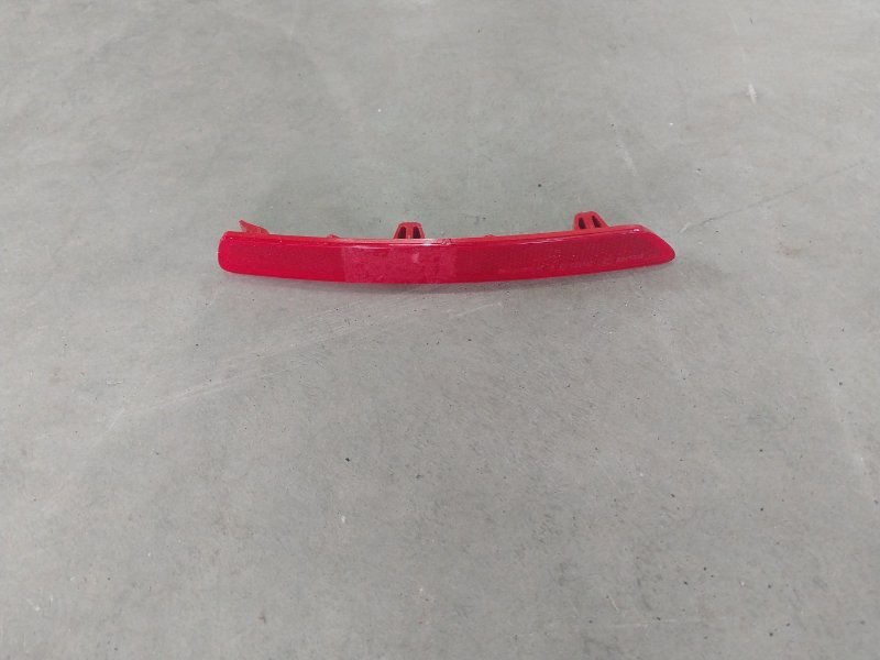 Отражатель в бампер задний левый