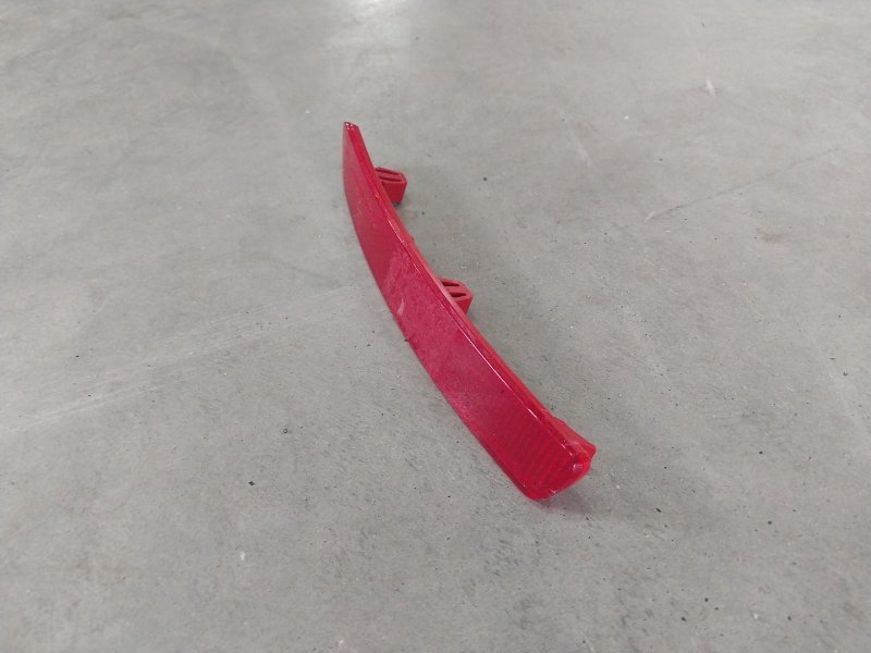 Отражатель в бампер задний левый