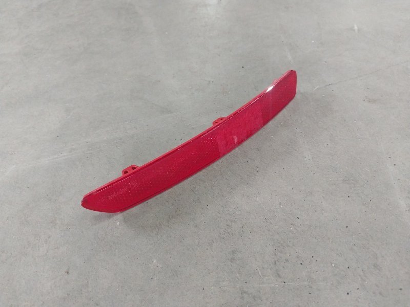 Отражатель в бампер задний левый