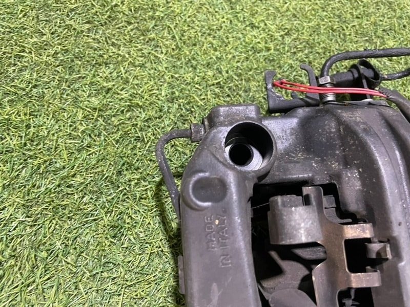 Суппорт задний левый