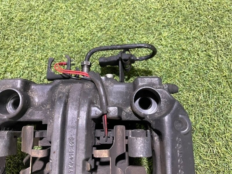 Суппорт задний левый