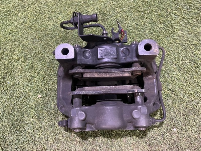 Суппорт задний левый