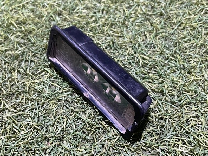 Фонарь подсветки номера