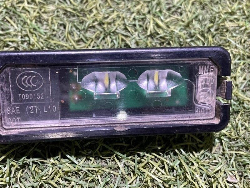 Фонарь подсветки номера