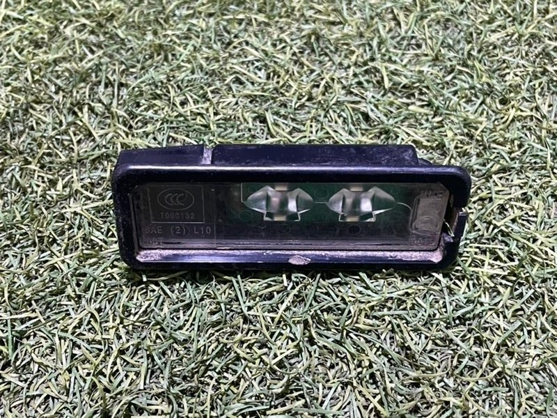 Фонарь подсветки номера