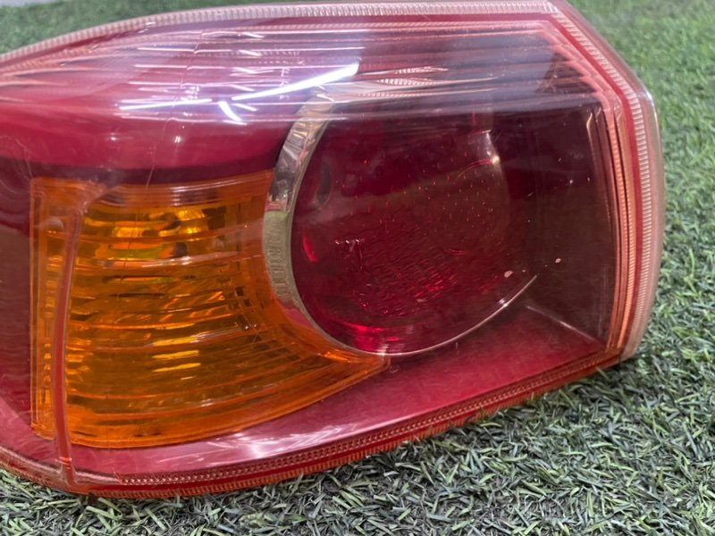Фонарь задний наружный левый