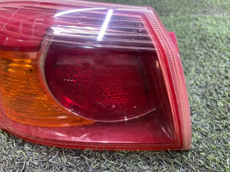 Фонарь задний наружный левый