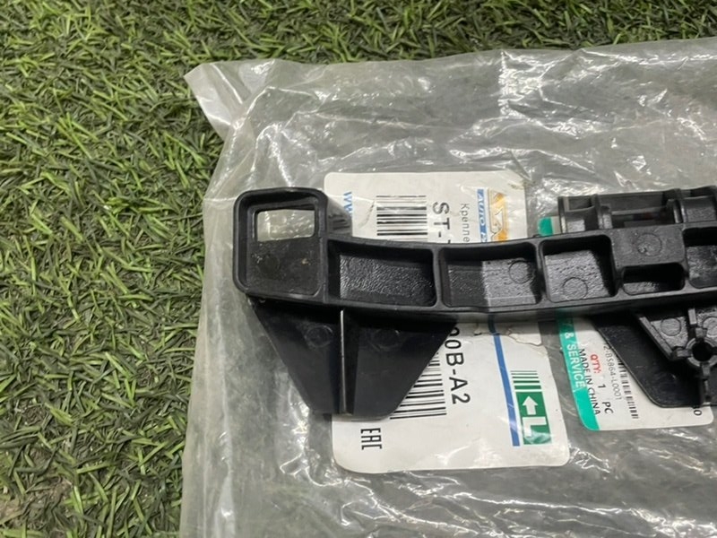 Кронштейн фар левый