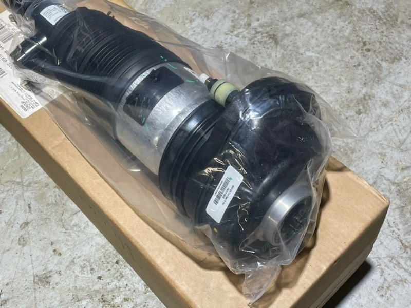 Амортизатор передний левый