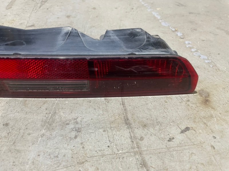 Фонарь задний в бампер левый