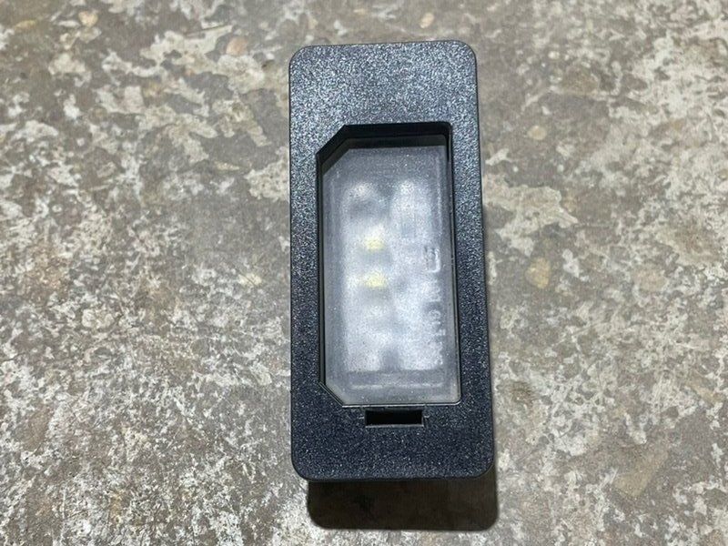 Фонарь подсветки номера