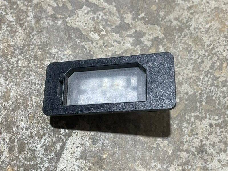 Фонарь подсветки номера