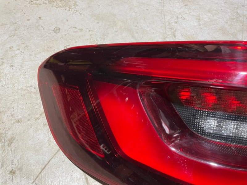 Фонарь задний наружный левый