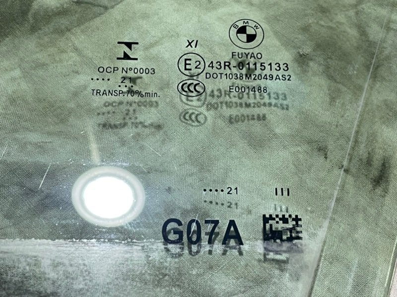 Стекло двери передней левой