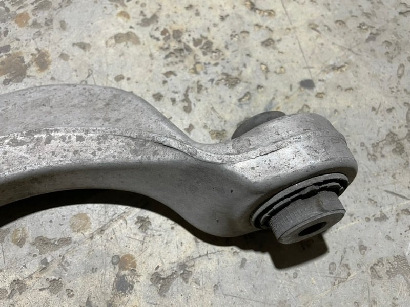 Рычаг задний левый