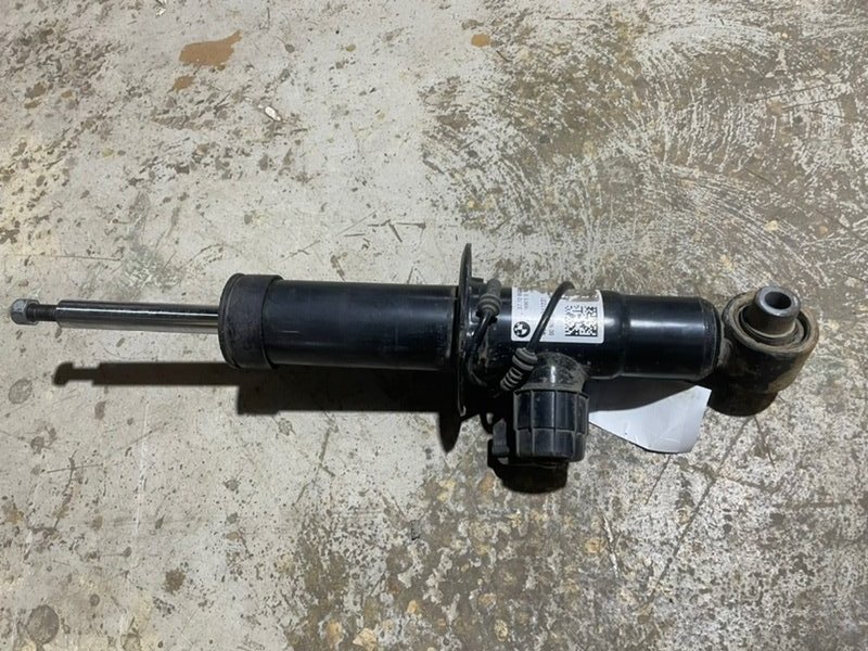 Амортизатор задний левый