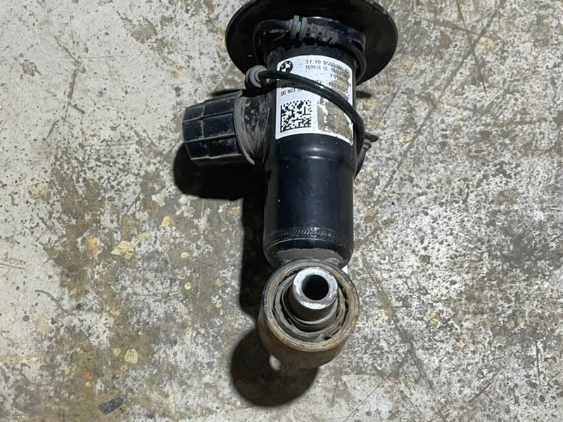 Амортизатор задний левый