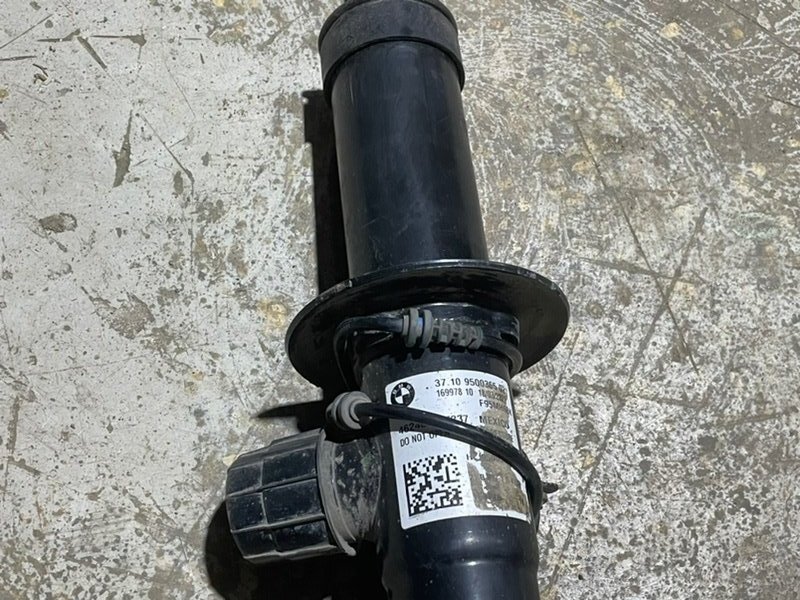 Амортизатор задний левый